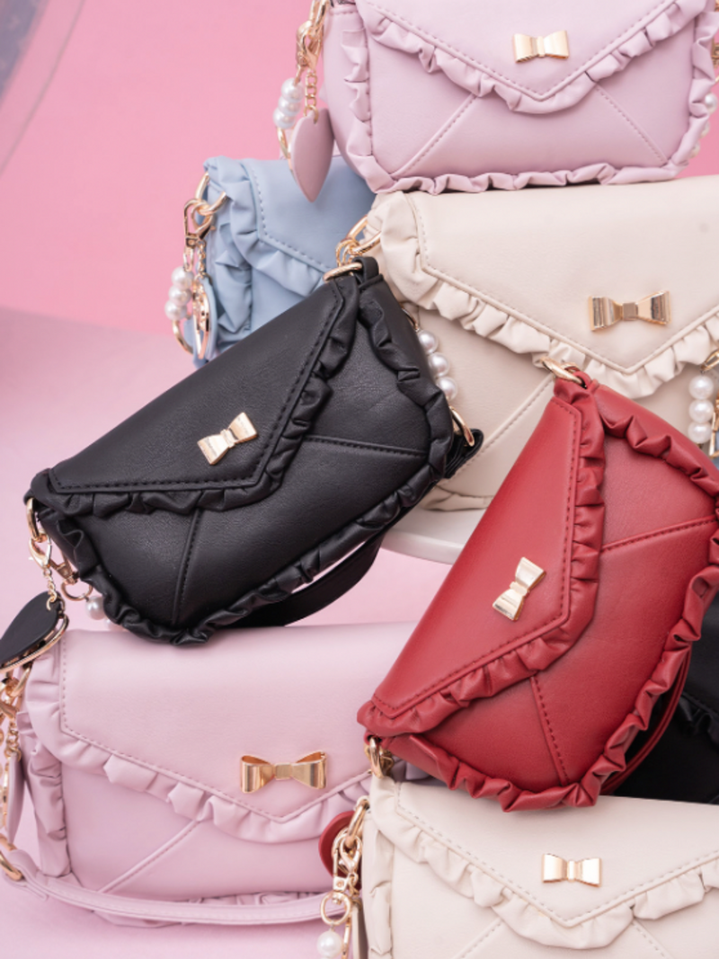 Bag With Heart Strap and Bow Ruffle