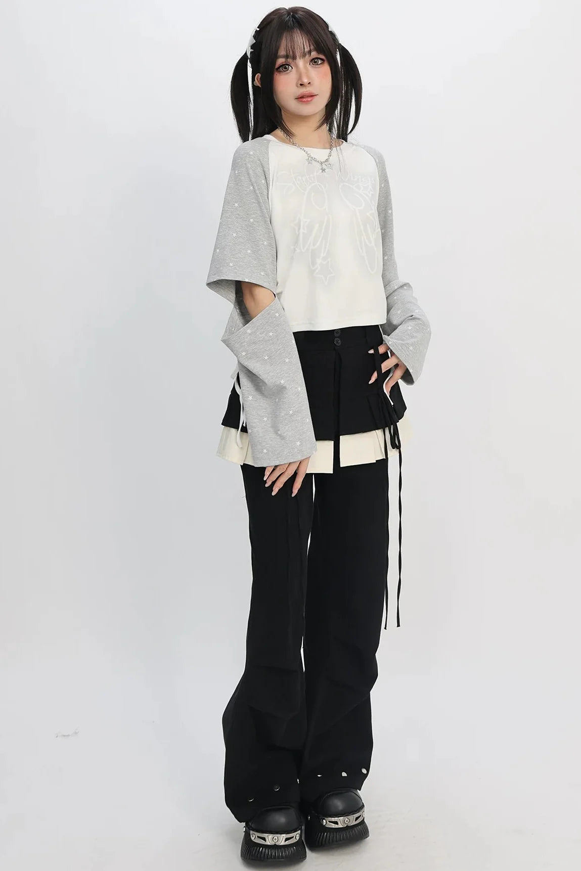 Mode Cut-out Star Drawstring Top