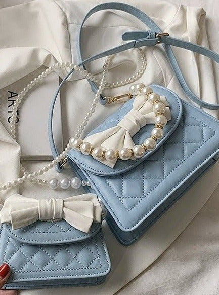 Pearl Handle Quilted Bow Shoulder Bag