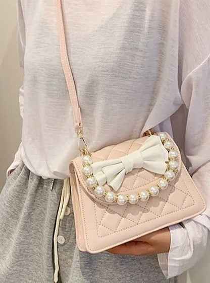 Pearl Handle Quilted Bow Shoulder Bag