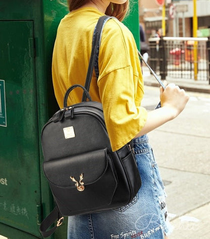 Reindeer Motif Leather-look Logo Plate Backpack