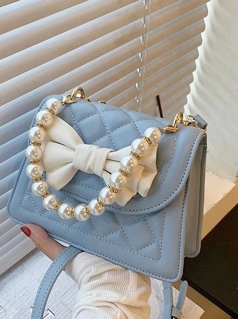 Pearl Handle Quilted Bow Shoulder Bag
